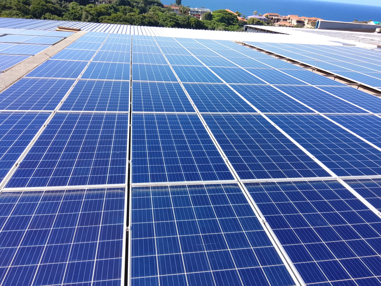 Large solar array on a flat commercial roof