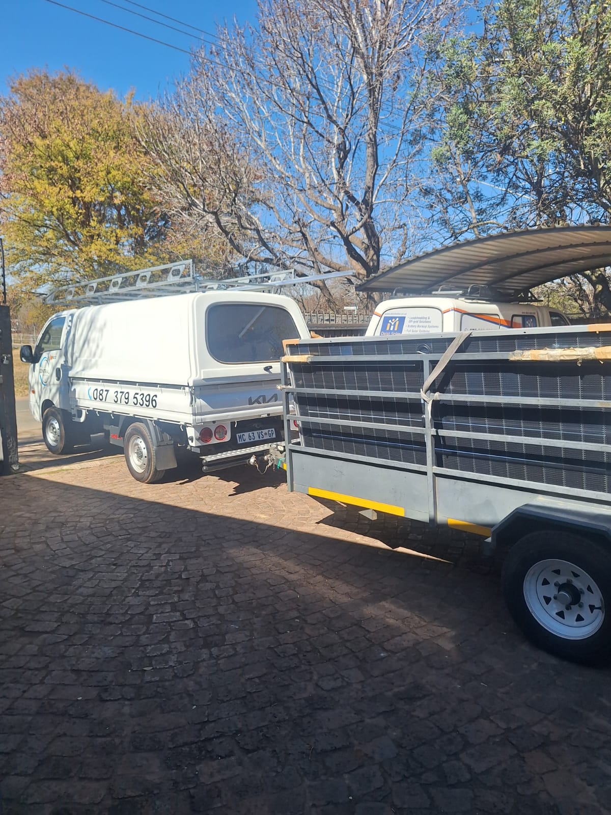Solar panels loaded on a trailer ready for delivery to site